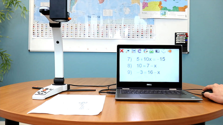 Desktop CCTV camera magnifying a paper document, which is displayed through SuperNova on a PC.